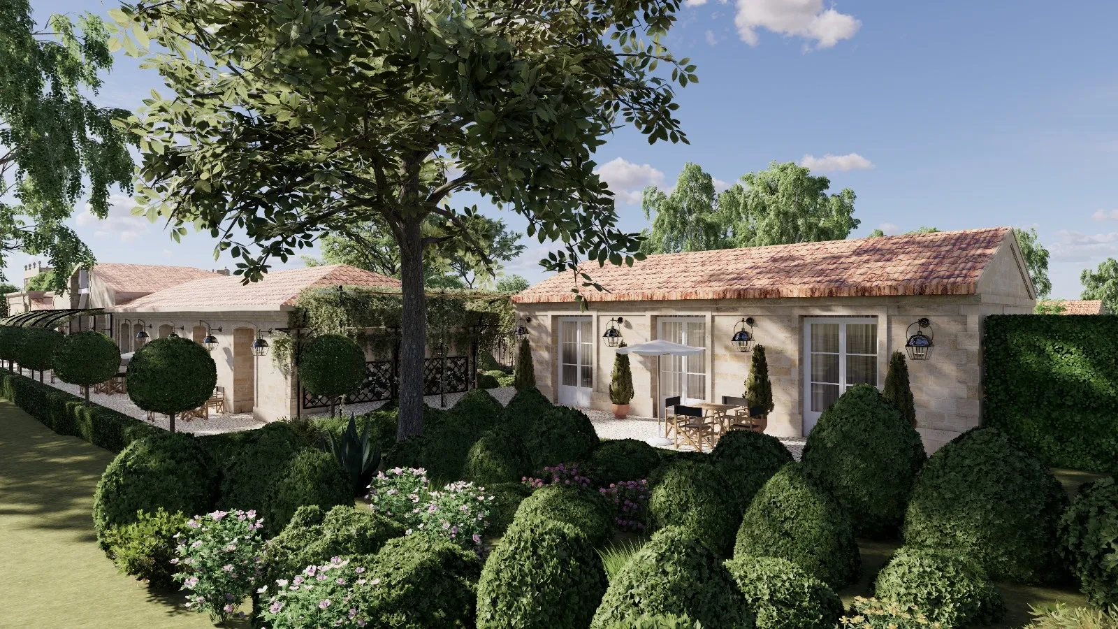 Mediterranean-style home with manicured garden and patio